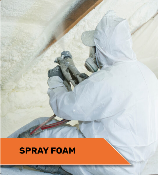 installer spraying foam insulation